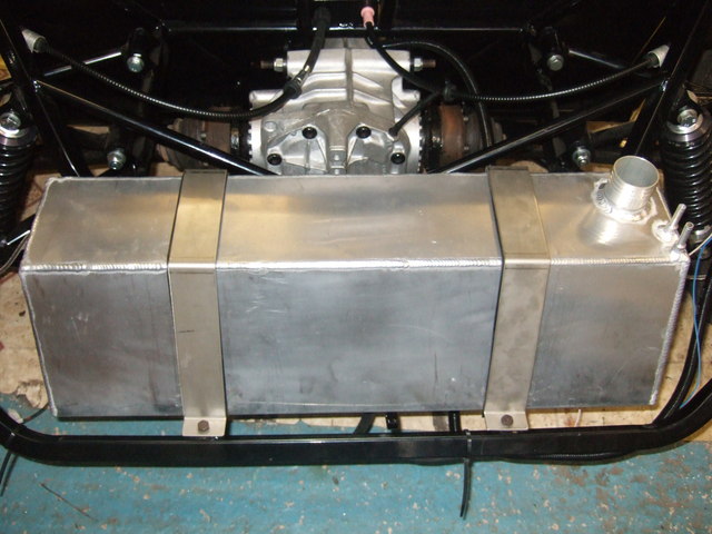 fuel tank with straps
