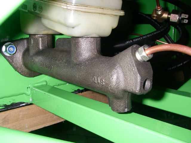 Master cylinder fouling chassis