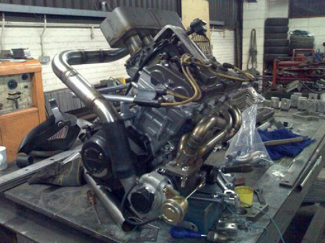 front side angle view on bench, headders, turbo and plenum
