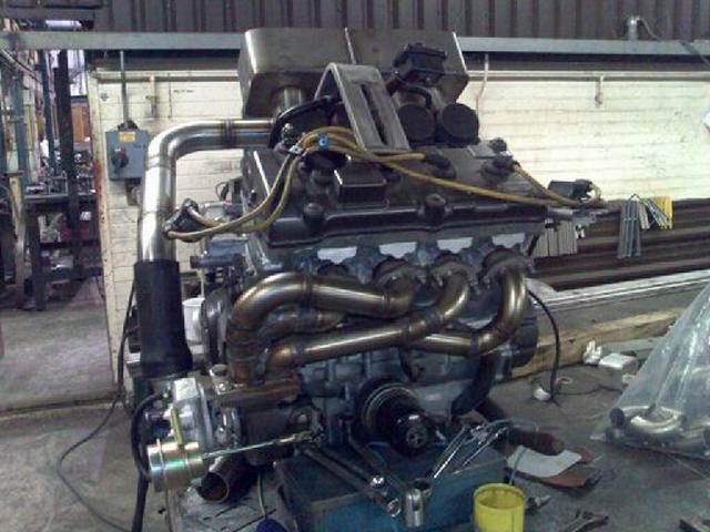 front view on bench, headders, turbo and plenum