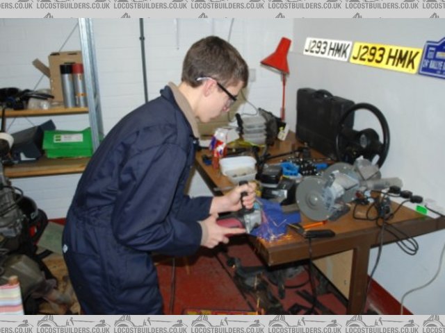 Me grinding the metal sleeves down a bit, all too long!!!!