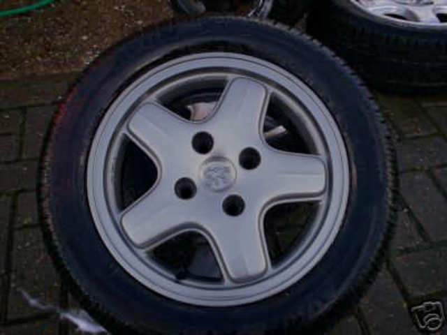 Rescued attachment wheelcharcoal.jpg