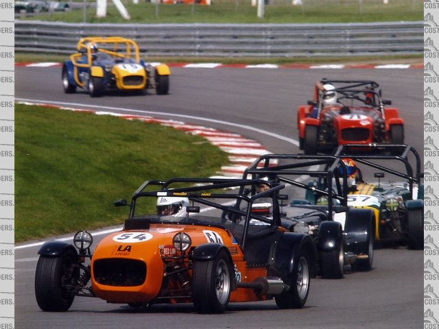 Alli at brands with Dickie B in car 71 behind