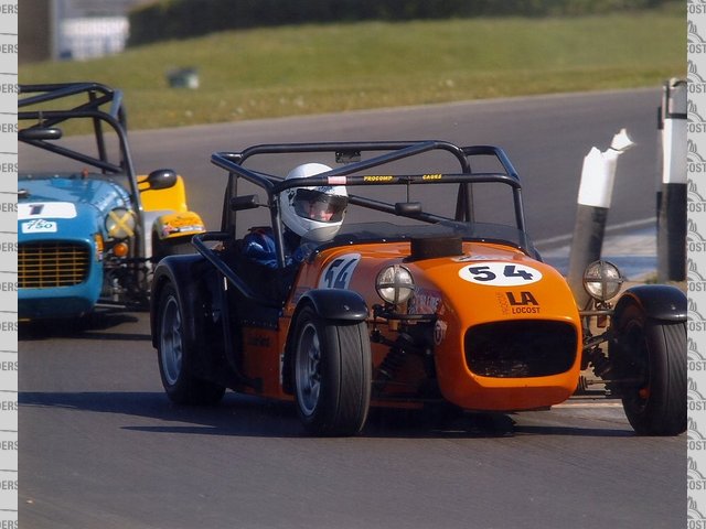 Alli leading Brian Mitcham 2004 champion . At donnington not supprising as Brian has only got half a car