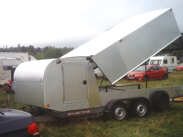 trailer with tilting top